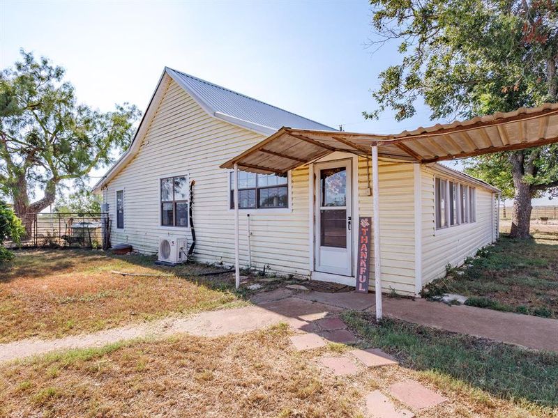 Front exterior of a new home in , Coleman, TX, highlighting curb appeal (Image 20).