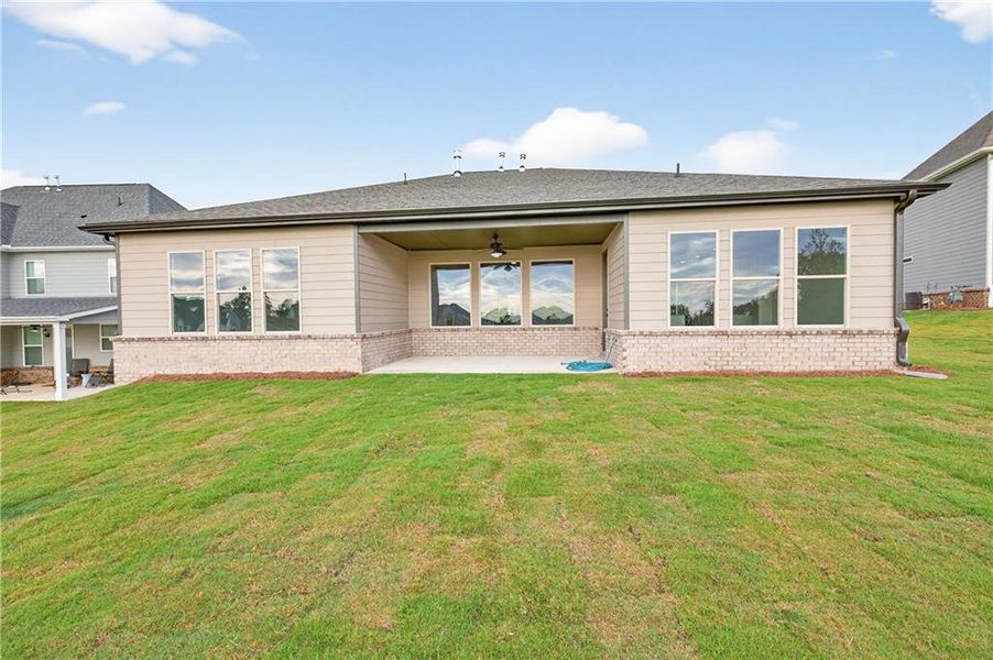 Exterior details and patio area of a home in The Manor at Gainesville Township, Gainesville (Image 21).