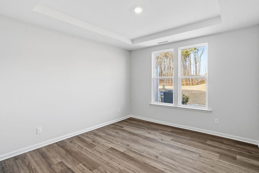 Spacious, unfurnished interior of a new home in Ovation at Sweetbrier, Durham (Image 28).