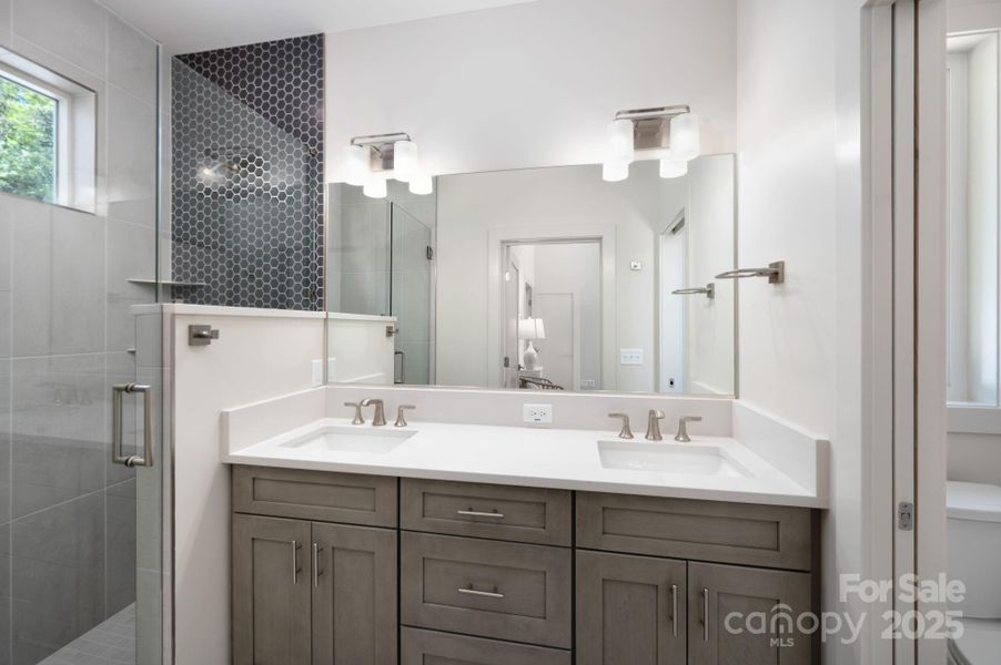 Well-Appointed Ensuite Primary Bathroom Well-Appointed Ensuite Primary Bathroom