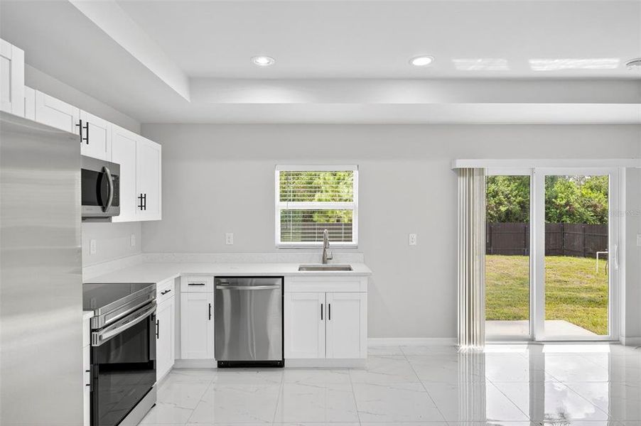 Furnished interior view inside a new home in , Lehigh Acres (Image 7).