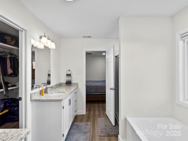 Primary Ensuite Bathroom with Separate Tub & Shower Stall