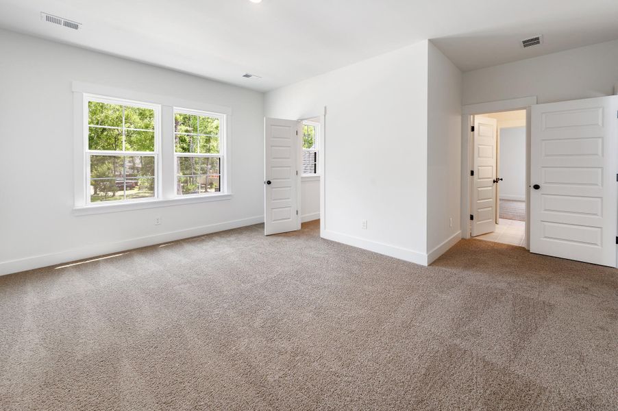 Spacious, unfurnished interior of a new home in Indigo Place, North Charleston (Image 27).