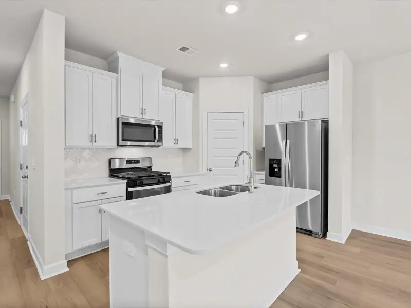 Furnished interior view inside a new home in Crossing at Abner Creek Townes, Greer (Image 3). Furnished interior view inside a new home in Crossing at Abner Creek Townes, Greer (Image 3).