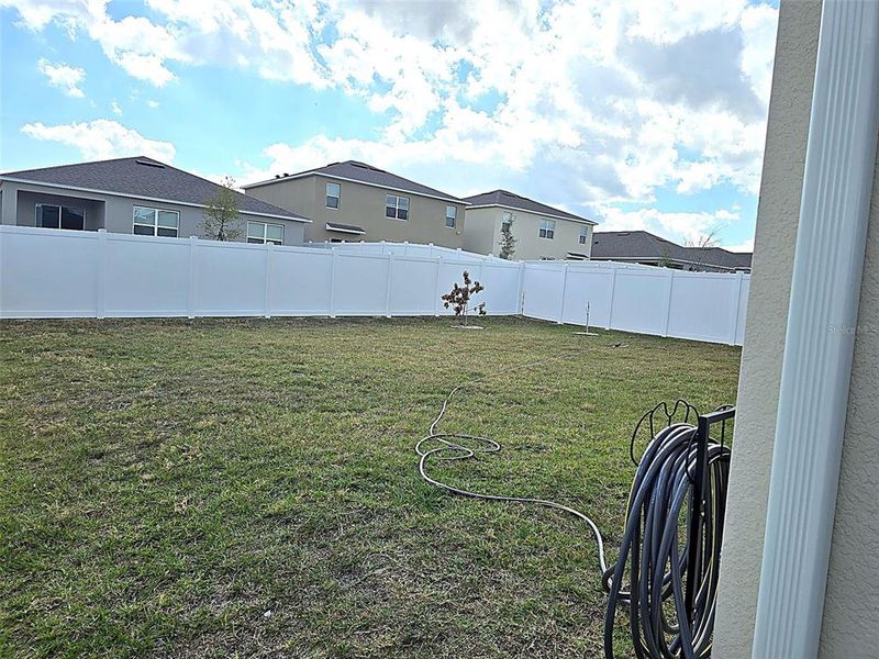 Exterior details and patio area of a home in Wind Meadows South, Bartow (Image 29).