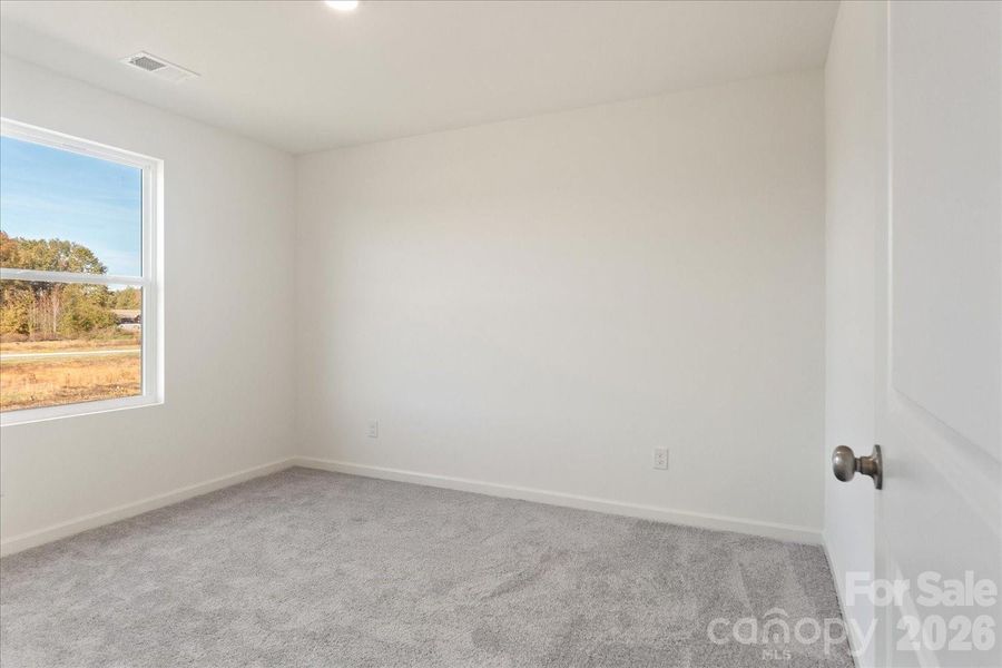 Spacious, unfurnished interior of a new home in Frey Creek, Spartanburg (Image 22).