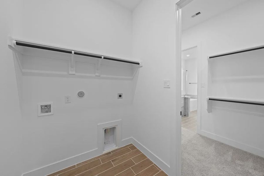 Representative unfurnished interior of a home built from the Summerton by Chesmar Homes in University Heights, Round Rock (Image 25).