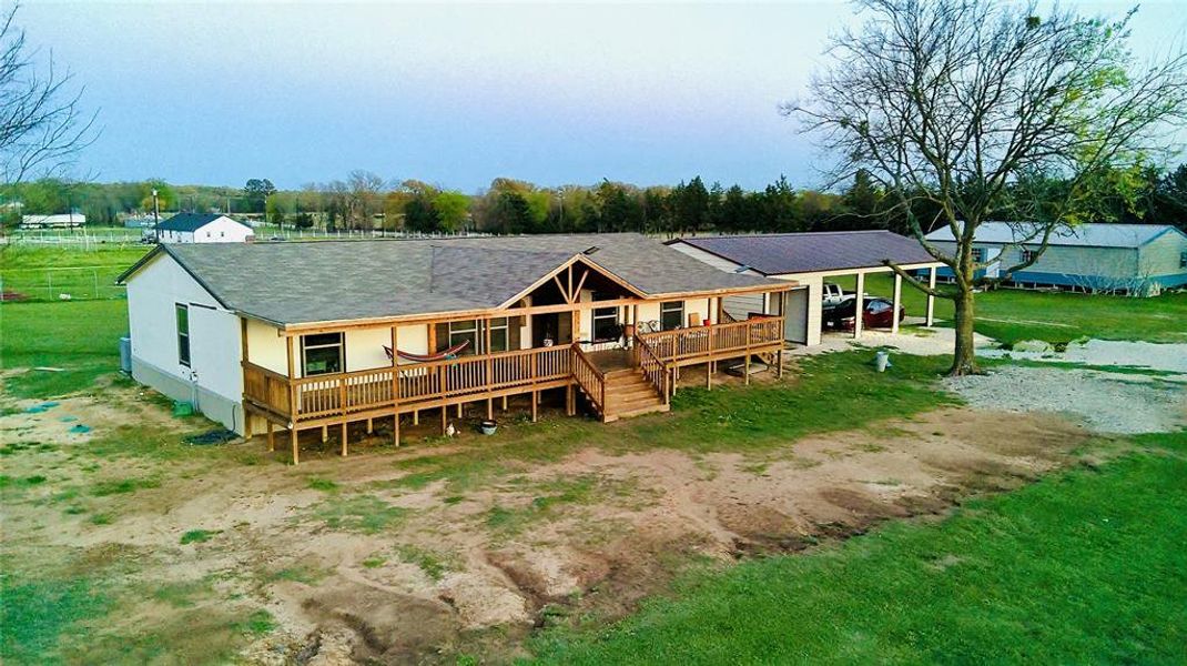 Exterior details and patio area of a home in , Wills Point (Image 10).
