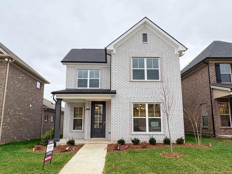 Front exterior of a new home in , Gallatin, TN, highlighting curb appeal (Image 1). Front exterior of a new home in , Gallatin, TN, highlighting curb appeal (Image 1).