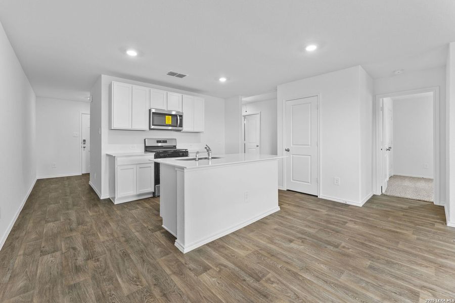 Furnished interior view inside a new home in Avenida, Converse (Image 8).