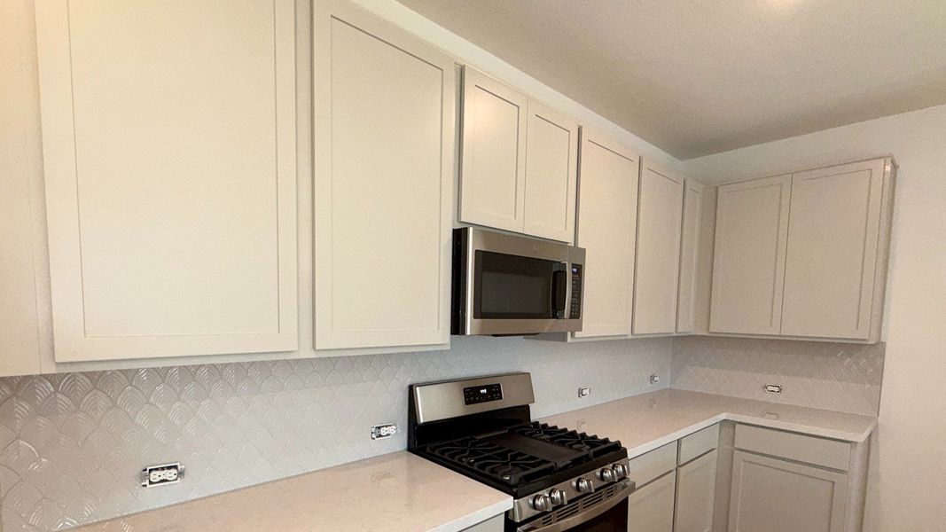 Furnished interior view inside a new home in Flora, Hutto (Image 5).