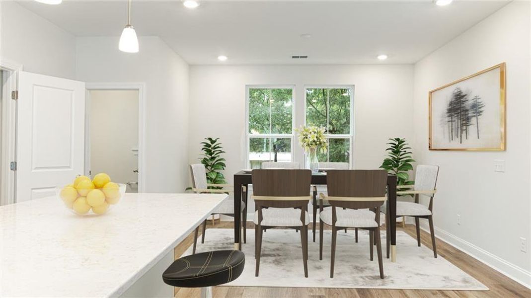 Dining space featuring light hardwood / wood-style flooring