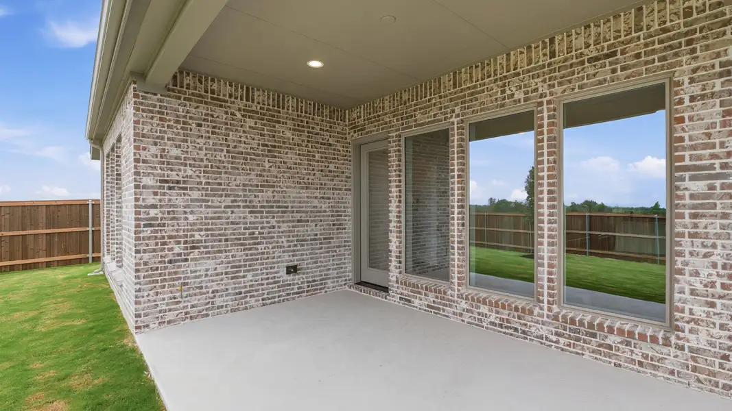 Exterior details and patio area of a home in Meraki, Forney (Image 4).