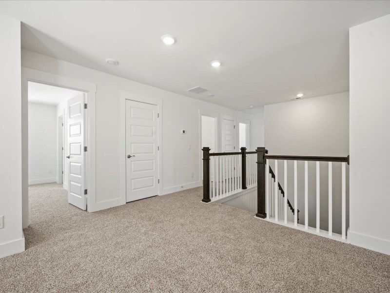 Spacious, unfurnished interior of a new home in The Coves at Lakes of Cane Bay, Summerville (Image 16). Spacious, unfurnished interior of a new home in The Coves at Lakes of Cane Bay, Summerville (Image 16).