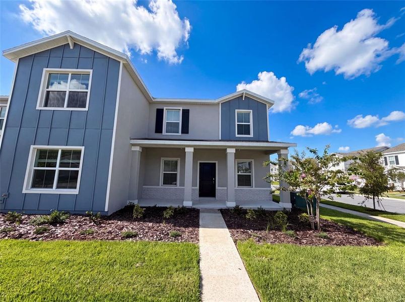 Front exterior of a new home in , Apopka, FL, highlighting curb appeal (Image 14).