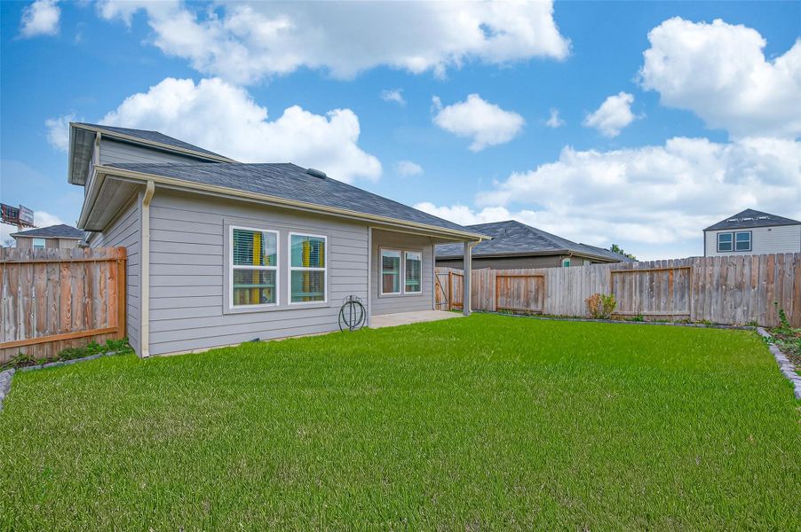 Exterior details and patio area of a home in Legacy Park, Houston (Image 19).