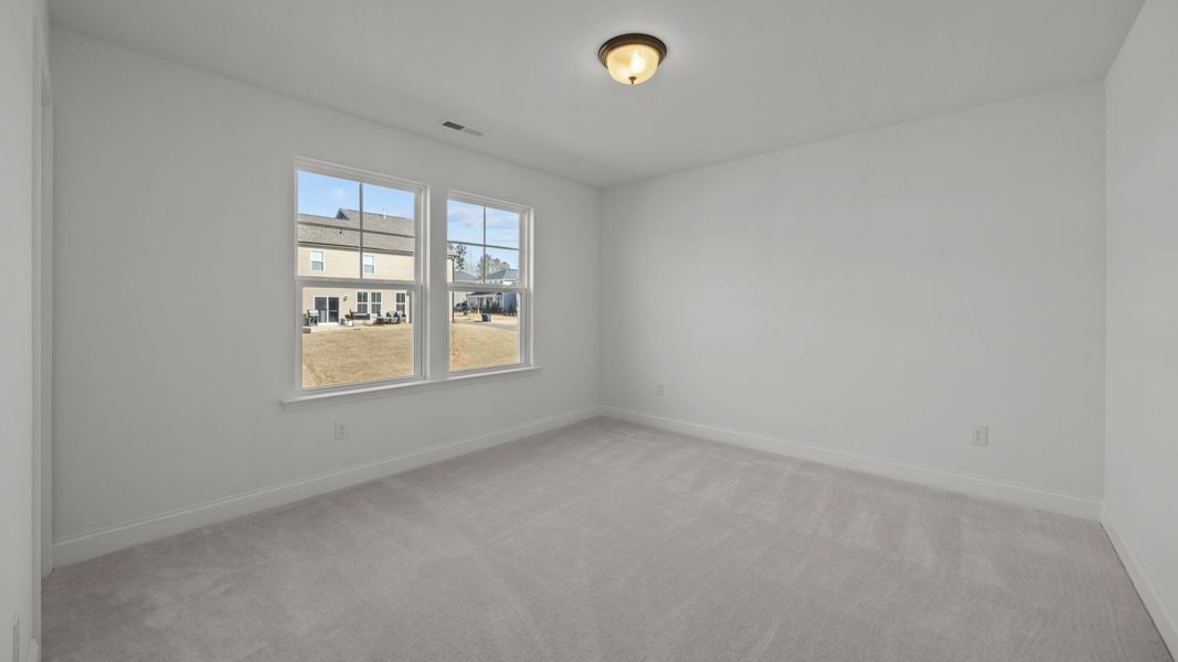 The Burton Plan in Lakeside Glen by DBR Homes in York, SC - Bedroom