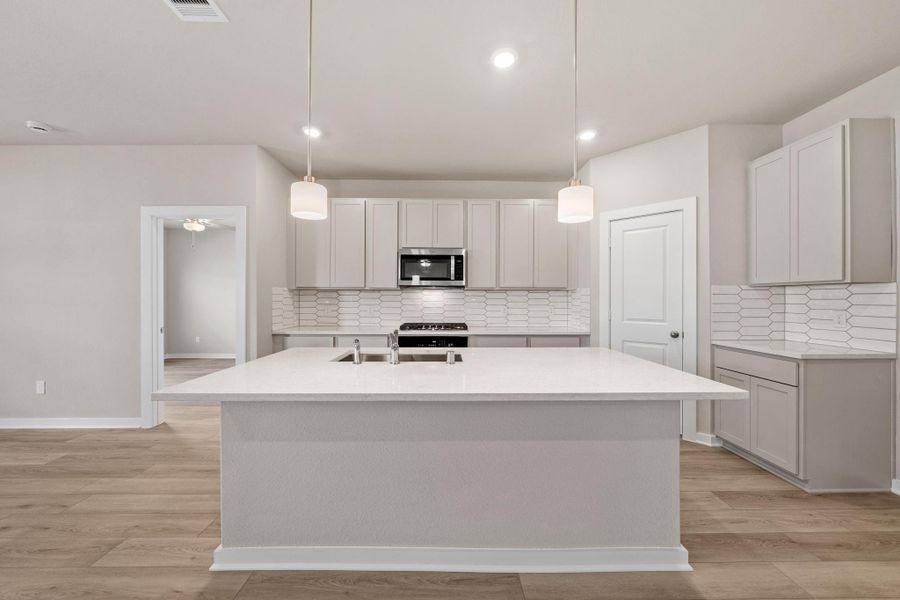 Furnished interior view inside a new home in Windrose Green 50', Angleton (Image 11).