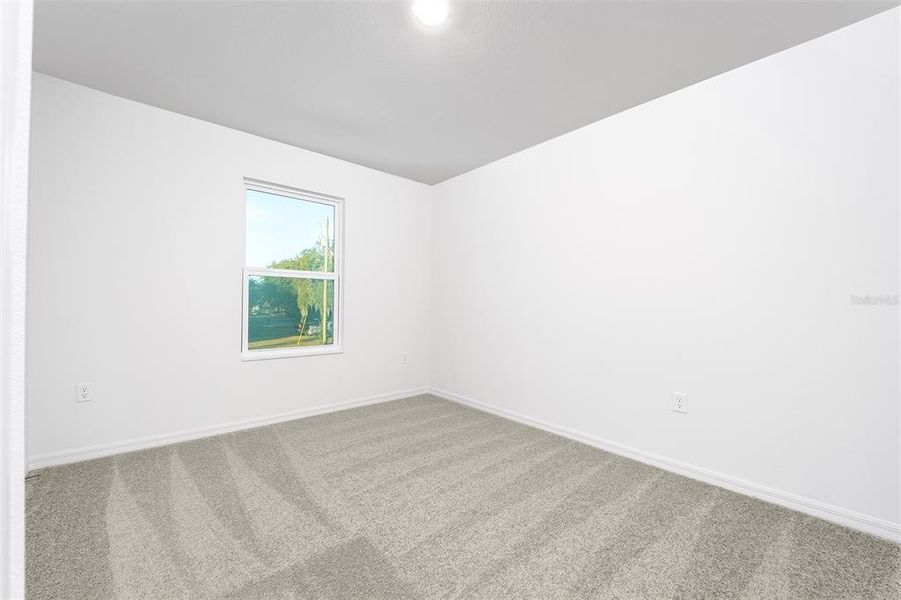 Spacious, unfurnished interior of a new home in Tula Parc, Astatula (Image 18).