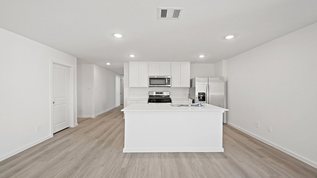 Representative furnished interior of a home built from the Carson by D.R. Horton in Lexington Heights, Willis (Image 5).