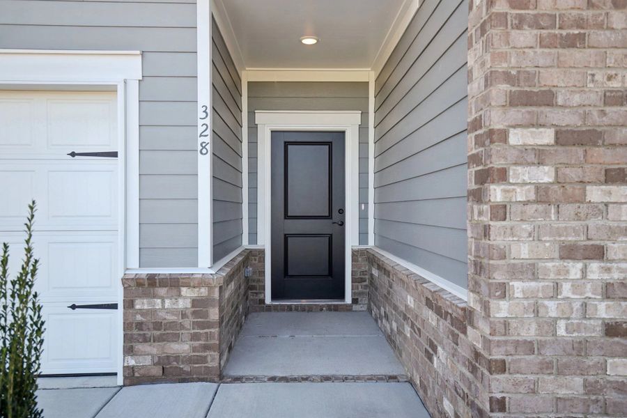 Exterior details and patio area of a home in Cedars at Cane Ridge | 55+ Community, Antioch (Image 3). Exterior details and patio area of a home in Cedars at Cane Ridge | 55+ Community, Antioch (Image 3).