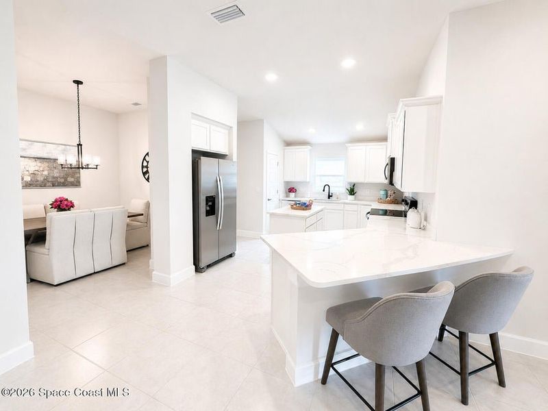 Furnished interior view inside a new home in St. John's Preserve, Palm Bay (Image 6).