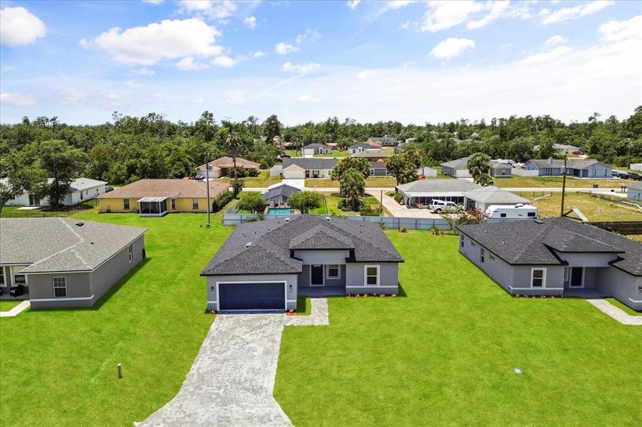 Front exterior of a new home in , Ocala, FL, highlighting curb appeal (Image 25). Front exterior of a new home in , Ocala, FL, highlighting curb appeal (Image 25).