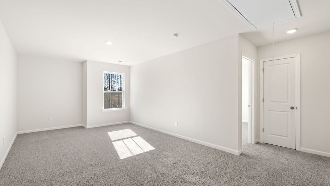 Representative unfurnished interior of a home built from the WILMINGTON by D.R. Horton in Benjamin's Grove, Woodruff (Image 24).