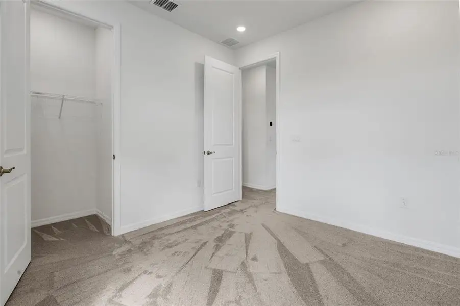 Spacious, unfurnished interior of a new home in Turnleaf, Punta Gorda (Image 11).