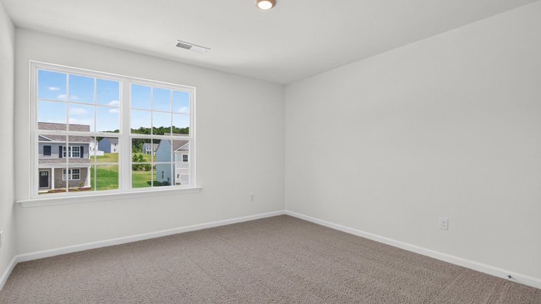 Spacious, unfurnished interior of a new home in The Reserve at Prestleigh, Wake Forest (Image 25).