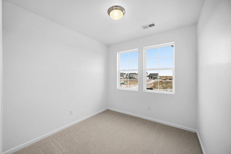 Spacious, unfurnished interior of a new home in Trailstone, Arvada (Image 20).