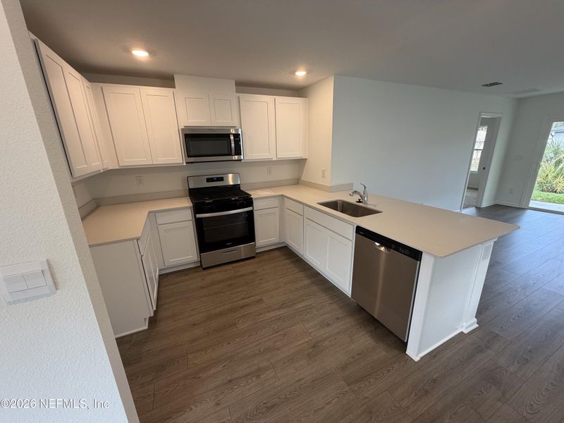 Furnished interior view inside a new home in Grand Reserve, Bunnell (Image 26).