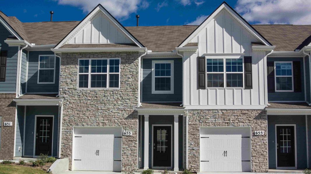 Front exterior of a new home in Woodbridge Glen Townhomes, Lebanon, TN, highlighting curb appeal (Image 1).