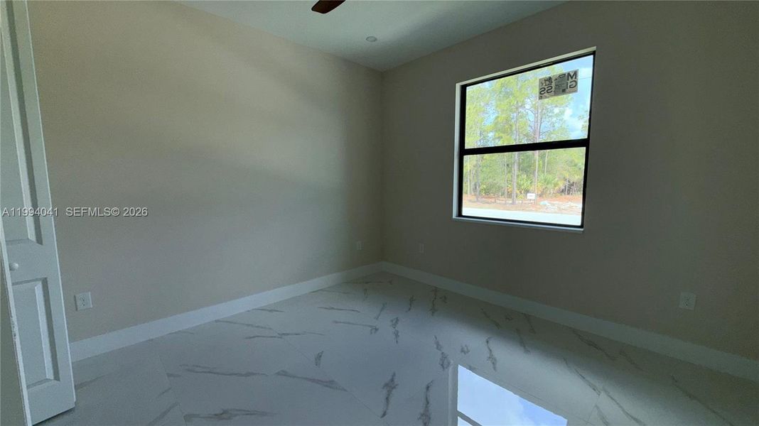 Spacious, unfurnished interior of a new home in , Lehigh Acres (Image 26).