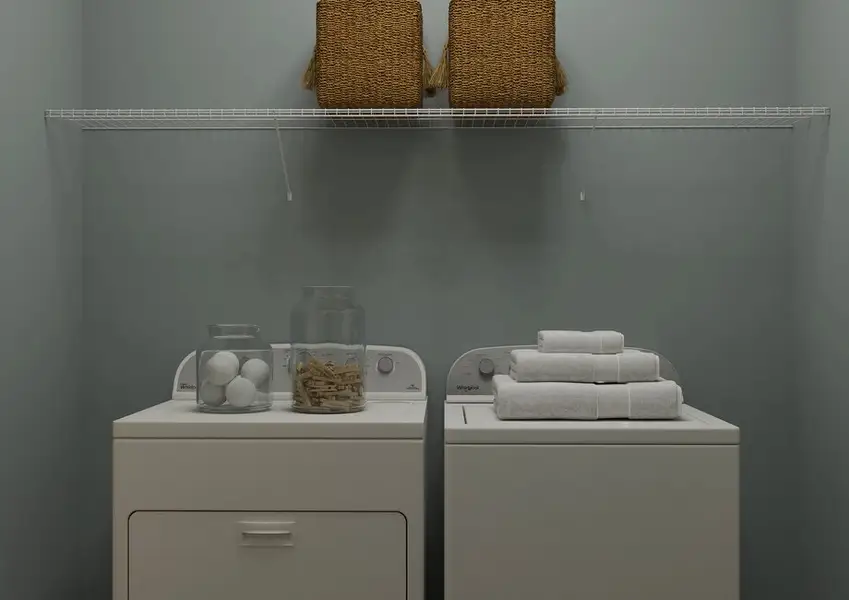 Rendering of a laundry room with a built-in shelve above the washer and dryer. Rendering of a laundry room with a built-in shelve above the washer and dryer.