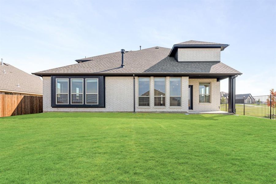 Front exterior of a new home in Parks at Panchasarp Farms 65, Burleson, TX, highlighting curb appeal (Image 2). Front exterior of a new home in Parks at Panchasarp Farms 65, Burleson, TX, highlighting curb appeal (Image 2).