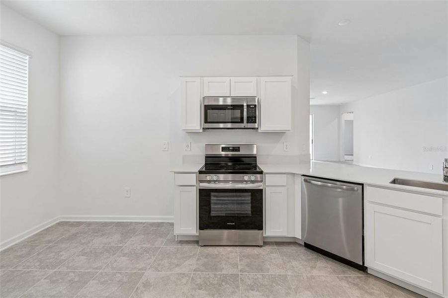 Furnished interior view inside a new home in Peace Creek Reserve, Winter Haven (Image 14).