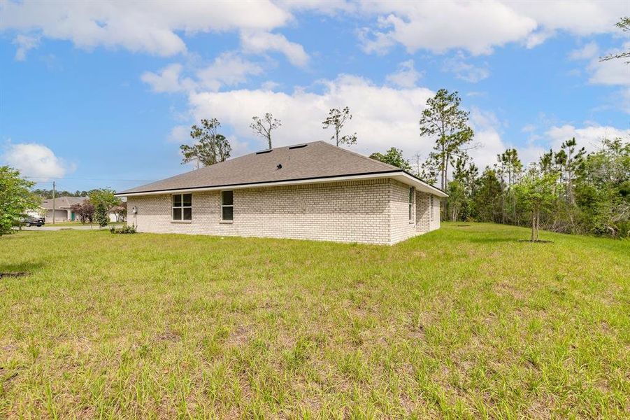 Exterior details and patio area of a home in Palm Coast, Palm Coast (Image 24).