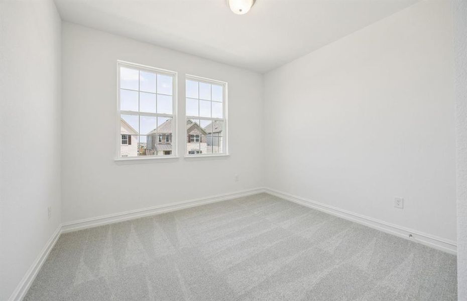 Secondary bedroom designed with generous storage solutions  *Real home pictured