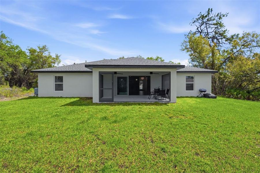 Exterior details and patio area of a home in , Port Charlotte (Image 26).