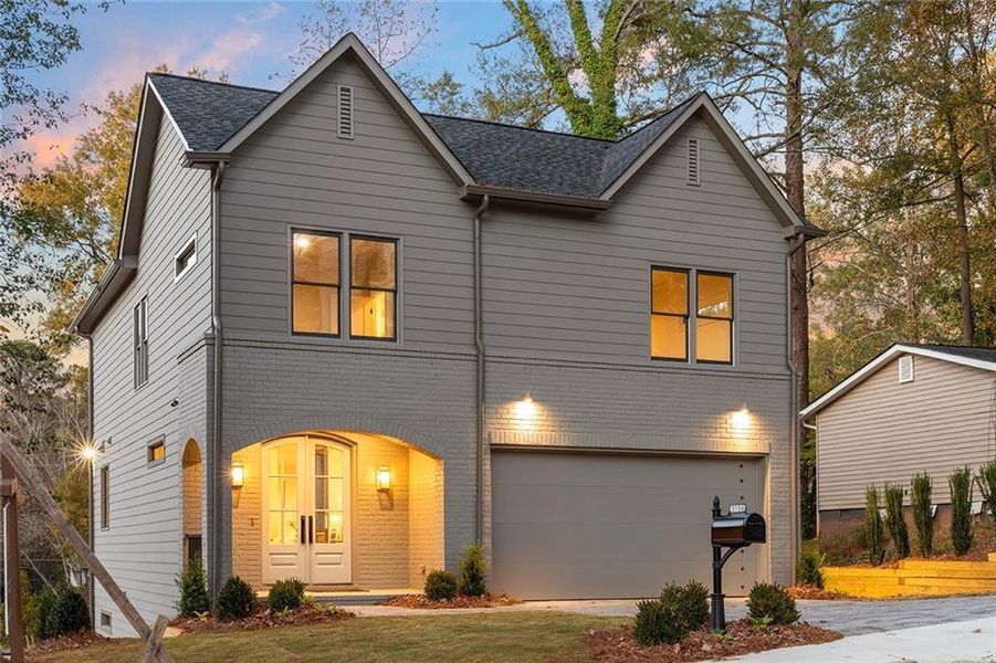 Front exterior of a new home in , Scottdale, GA, highlighting curb appeal (Image 2).