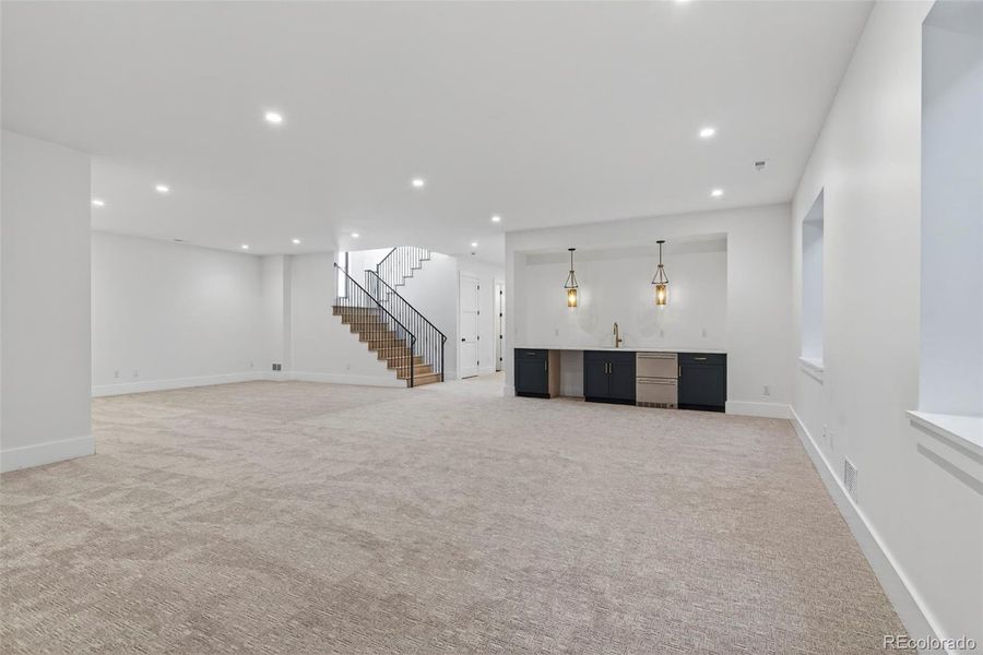 fully finished basement with wet bar
