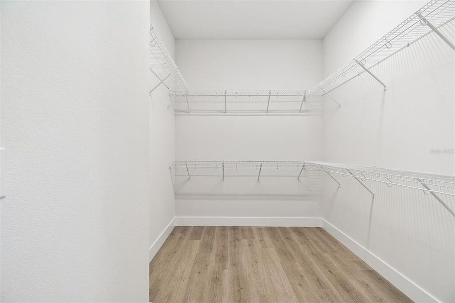 Spacious, unfurnished interior of a new home in Emerald Landing at Waterside at Lakewood Ranch – Cottage Series, Sarasota (Image 33).