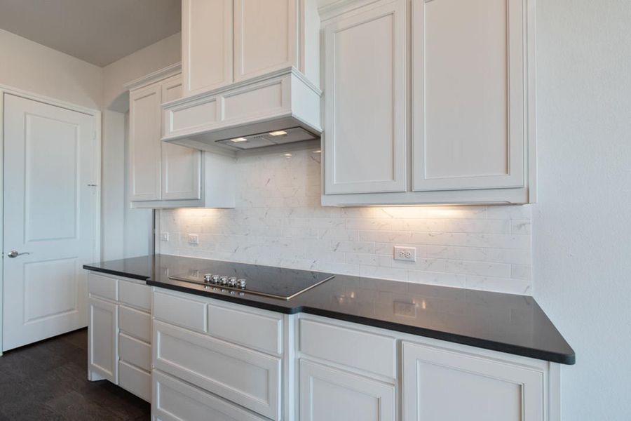 Kitchen | Concept 2406 at The Meadows in Gunter, TX by Landsea Homes