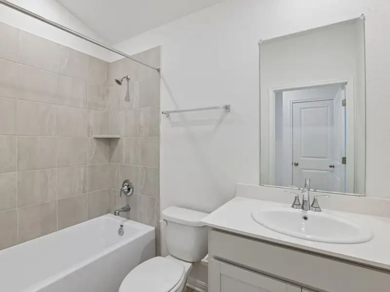 Furnished interior view inside a new home in Lexington Parke, Del Valle (Image 4).