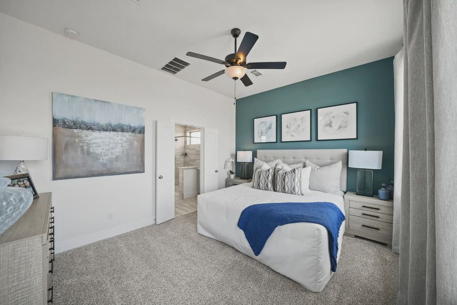Representative furnished interior of a home built from the Athens by Chesmar Homes in Sunterra, Katy (Image 13).