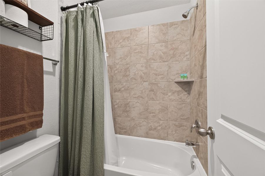 Furnished interior view inside a new home in Sweetgrass Village, Crosby (Image 27).