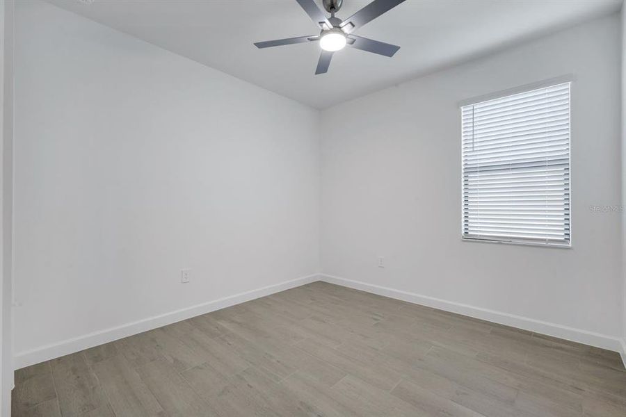 Spacious, unfurnished interior of a new home in Verdana Village, Estero (Image 19).