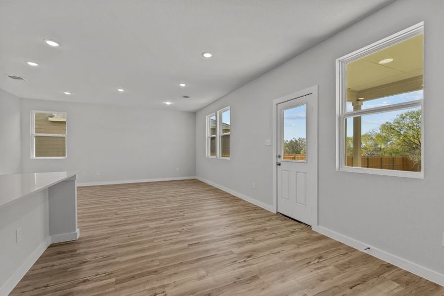 A room with white walls and windows. A room with white walls and windows.