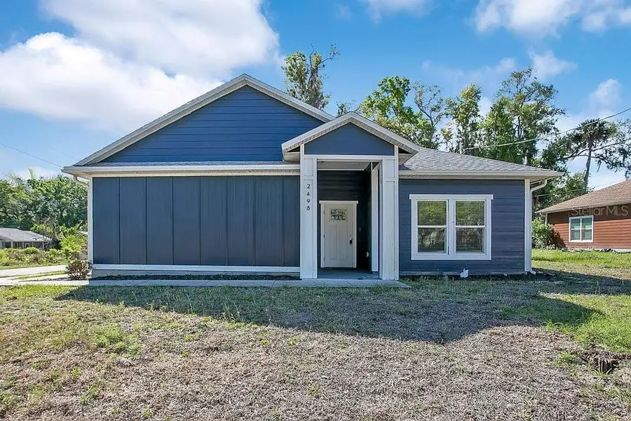 Front exterior of a new home in , Mims, FL, highlighting curb appeal (Image 1). Front exterior of a new home in , Mims, FL, highlighting curb appeal (Image 1).